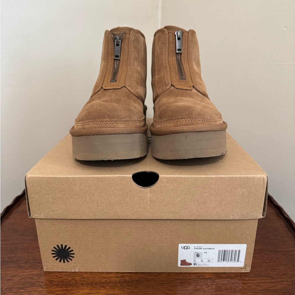 UGG boots. Zip front platform boots.